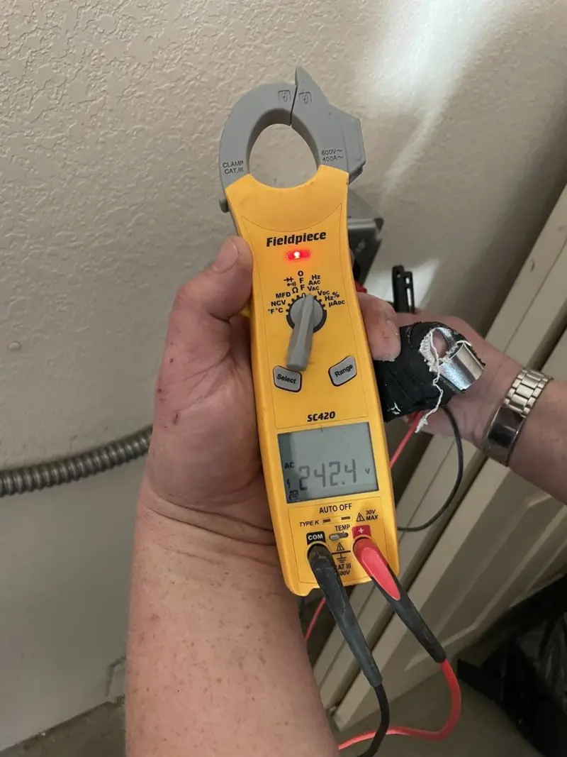 Voltage testing with clamp meter during Aluminum Wiring Replacement in Sandstone